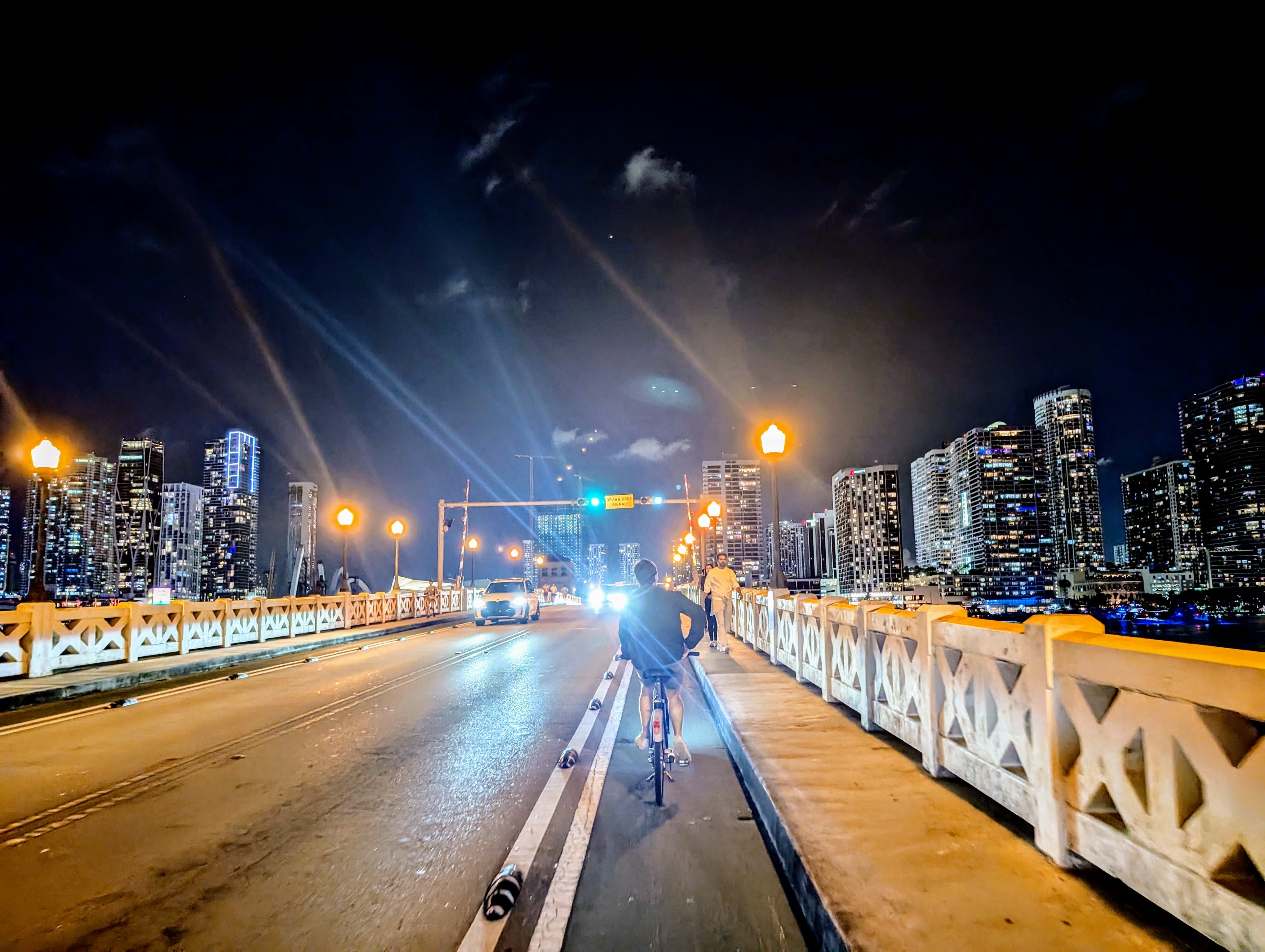brendan riding over the bridge